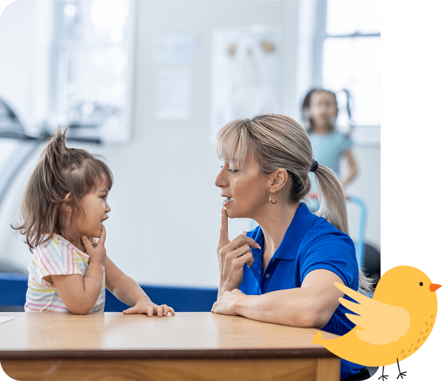 Child and adult in speech therapy session